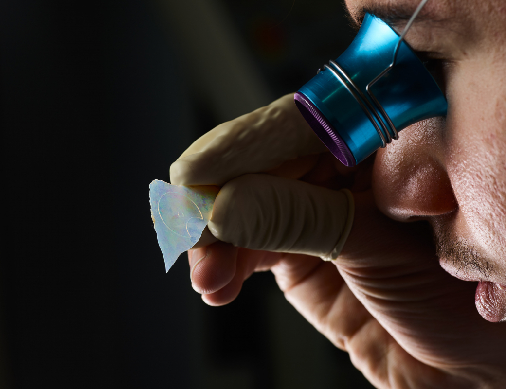 Checking_the_outline_of_the_hour-minute_subdial_of_the_Romain_Gauthier_Insight_Micro-Rotor_Lady_Opal_cut_on_an_opal_slice