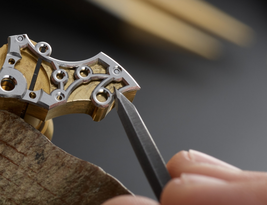 Bevelling a bridge from the Romain Gauthier Insight Micro-Rotor Squelette using a steel file