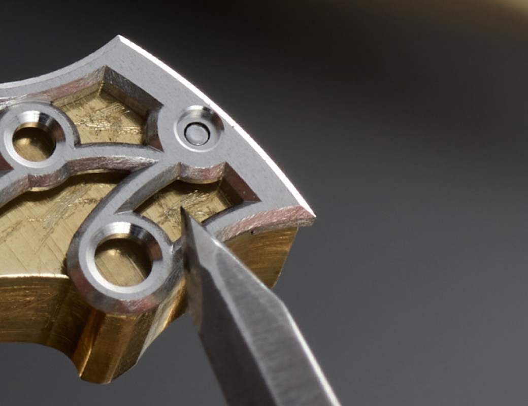 Bevelling a bridge from the Romain Gauthier Insight Micro-Rotor Squelette using a steel file