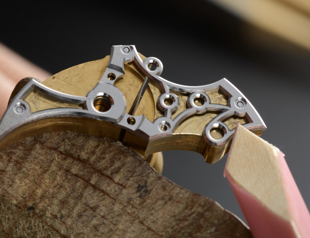 Softening and smoothing a bridge from the Romain Gauthier Insight Micro-Rotor Squelette using a buff